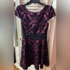 Purple and black velvet dress